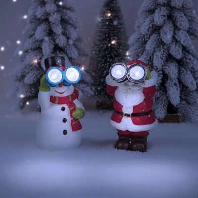 Immagine prodotto di Decorazione natalizia solare con luci LED - luce bianca fredda - pupazzo di neve, renna o Babbo Natale - funziona con l'energia solare - per interni ed esterni - resistente alle intemperie - 8 x 7,5 x 14 cm - 3 tipi a caso 1 pezzo [59763].