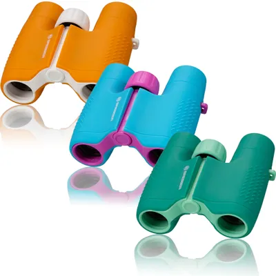 Three pairs of colorful children's binoculars are arranged diagonally on a white background.