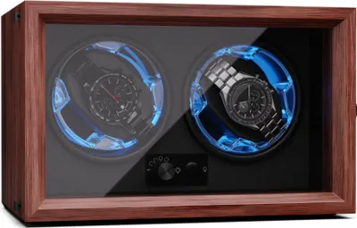 A watch winder with two compartments, each holding a watch, illuminated by blue LEDs.
