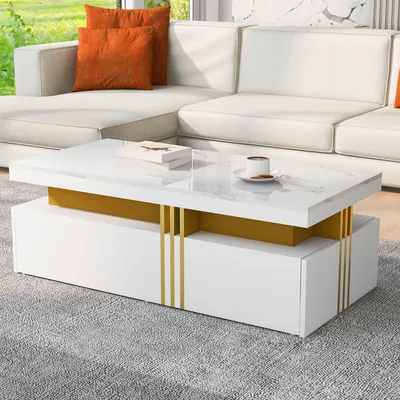 A modern living room scene with a white sectional sofa and a white coffee table with marble-look top and gold accents.