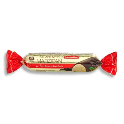 A single marzipan bar wrapped in foil and tied with red ribbon.