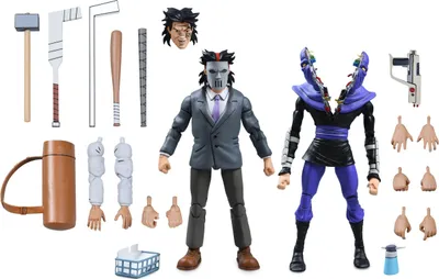 Two action figures and their accessories laid out on a white background.