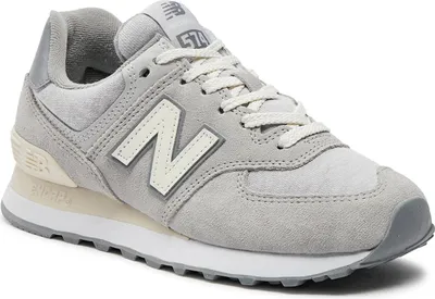 A close-up, studio shot of a New Balance sneaker.