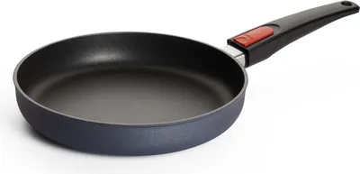 A frying pan with a black non-stick interior and a dark gray exterior, featuring a black handle with a red accent.