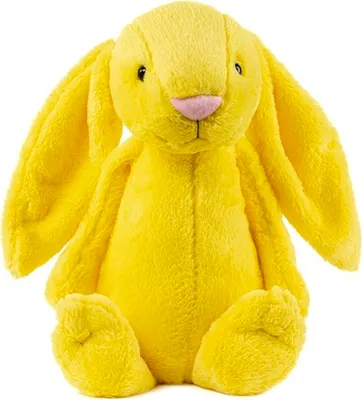 A studio shot of a yellow plush bunny toy.