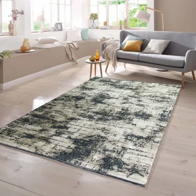 Produktbild von Moderner Teppich in Abstraktem Design in Beige auf Schwarz Größe - 120 x 170 cm