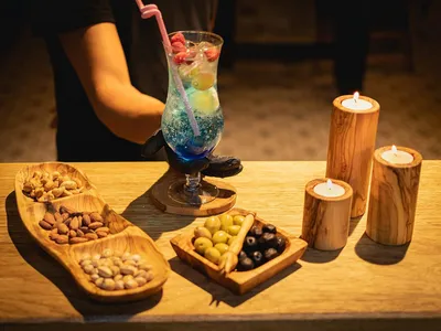 Produktbild von Olivenholz-Untersetzer - Handgemacht - Set von 6 - Rutschfest - Rund