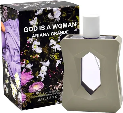 A perfume bottle and its box are displayed side-by-side.