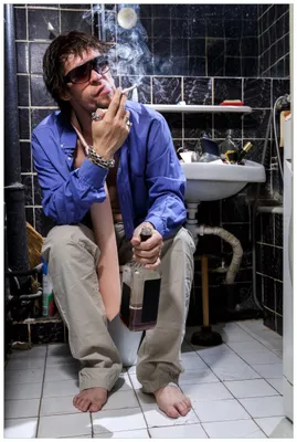 Produktbild von Wallario Wandbild aus Acryl, 90 x 60 cm, freischwebende Optik - Kloparty - Sexy Mann auf Toilette mit Zigarette
