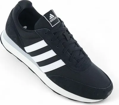 A single black Adidas sneaker with white stripes is shown against a white background.