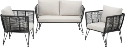 A set of outdoor furniture including a loveseat and two armchairs, arranged on a white background.
