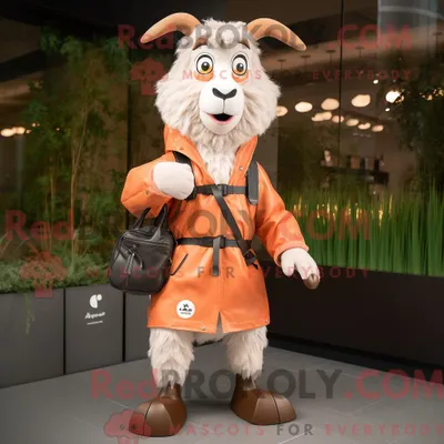 Obrázok produktu pre Maskot spoločnosti REDBROKOLY: broskyňová koza oblečená v vetrovke a s peňaženkami