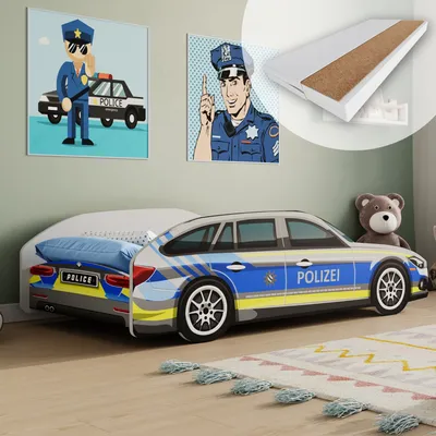 A child's bedroom with a police car-themed bed, two police-themed wall art pieces, and a teddy bear.