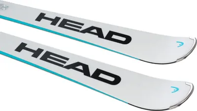 A close-up view of two skis with the brand name 'HEAD' printed on them.