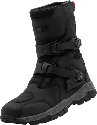 A single black motorcycle boot is shown against a white background.