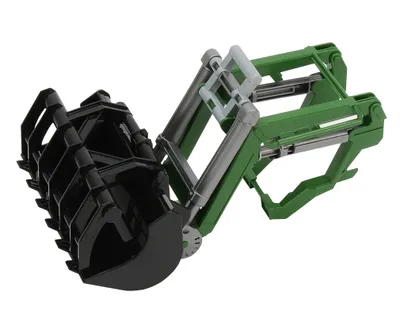 A black and green toy front loader attachment for a tractor.