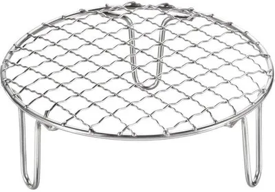 Zdjęcie produktu dla Kratka do pieczenia ze stali nierdzewnej o średnicy 15 cm z nóżkami o wysokości 50 mm, przeznaczona do grillowania i pieczenia