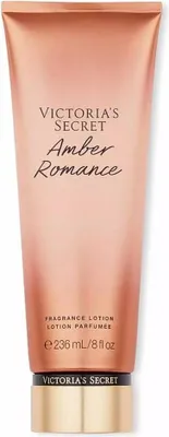 A close-up studio shot of a Victoria's Secret Amber Romance body lotion bottle against a white background.