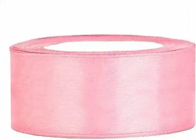 A roll of pink satin ribbon.