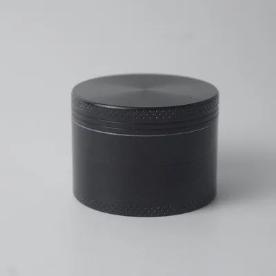 Immagine prodotto di Macinino per erbe essiccate nero, in zinco, con diametro di 63 mm