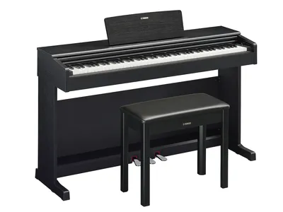 A black digital piano with a matching bench and music stand.