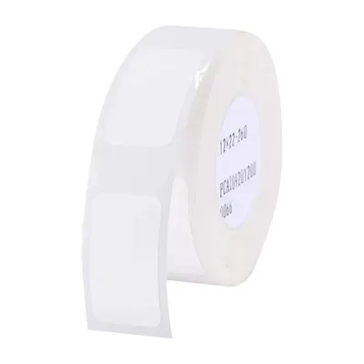 A roll of white labels on a white background.
