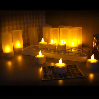 Imagen del producto de Velas LED sin llama recargables, con efecto parpadeante y base de carga, juego de 12 unidades
