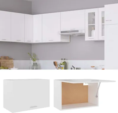 A modern white kitchen with upper cabinets and a range hood.