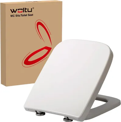 A white toilet seat is shown next to its brown cardboard packaging.