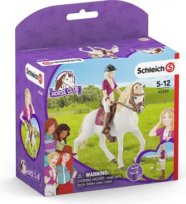 The image shows the packaging for a Schleich Horse Club toy set, featuring figures of a girl riding a horse and other girls. The background depicts a grassy field under a blue sky.