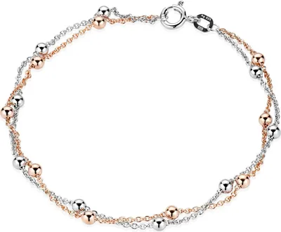 Doppelreihiges Armkettchen mit einem rosegoldenen und einem silbernen Strang, mit Kügelchen und Federringverschluss.