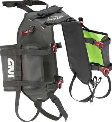 A black motorcycle saddlebag base with green interior and red buckles.