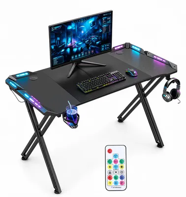 Image de Table de jeu ISOISL, dimensions 120x60 cm, design en forme de X, avec éclairage RGB LED, porte-gobelets et support pour casque