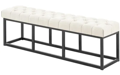 A cream-colored tufted bench with a black metal frame, shown from a slight angle against a white background.