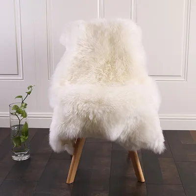 Produktbild von WOLTU Öko Lammfell Schaffell Teppich echtes Naturfell Weich und Flauschig Wollteppich für das Wohnzimmer Schlafzimmer Kinderzimmer Weiß  (90-100) x60cm