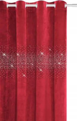 A close-up view of a red velvet curtain with silver glitter accents.
