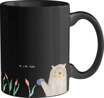Produktbild von Mr. & Mrs. Panda Teetasse Otter Stein - Schwarz - Geschenk, Keramiktasse, Tasse, Grüßen, Seeotter See, Munter, haferl, Bedruckte, Kaffeetasse, Pflanzen, Kaffeebecher
