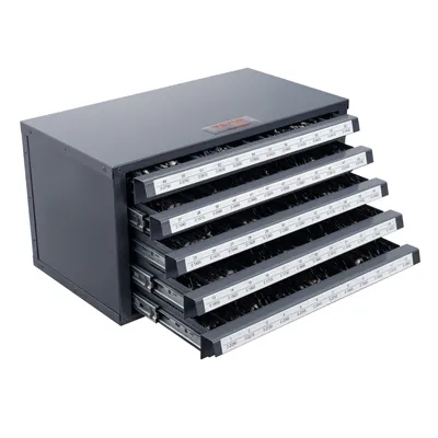 A gray metal cabinet with five drawers, each filled with drill bits. The drawers are labeled with measurements.