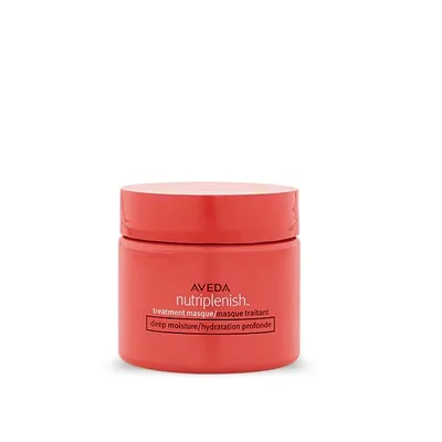 A product shot of a small, round, red jar of hair treatment masque.