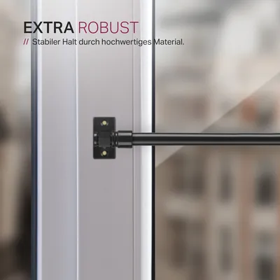 A close-up view of a black curtain rod attached to a white window frame, with text overlays.