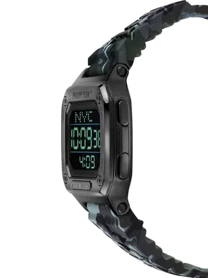 A close-up side view of a digital watch with a camouflage strap.