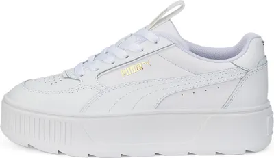 A side view of a white Puma sneaker with a platform sole.