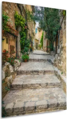 Produktbild von Wallario Premium Leinwandbild Alte steinerne Gasse in Südfrankreich in Größe 60 x 90 cm