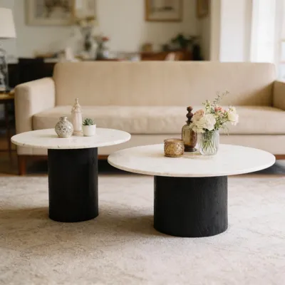 Produktbild von Couchtischset GANGA/YAMUNA mit Tischplatte aus Marmor, Weiß/Schwarz - Runder Beistelltisch im 2er Set, rundes Holzgestell aus Akazie, Wohnzimmertisch, Coffe Table