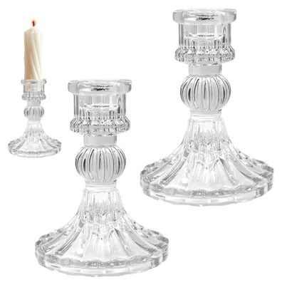 Image de 2 bougeoirs en verre avec un design diamant