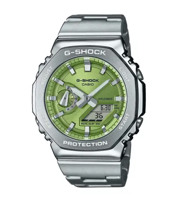A close-up studio shot of a silver and green G-Shock watch.