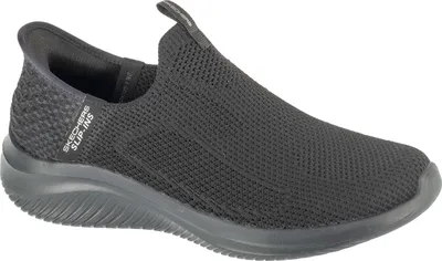 A black Skechers slip-on sneaker is shown from the side against a white background.
