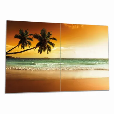 Produktbild von Wallario Herdabdeckplatte aus Glas, Größe 80 x 52 cm 2-teilig, Motiv Palmen am Sandstrand bei untergehender Sonne