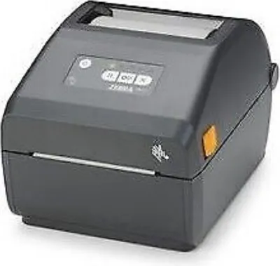 A dark gray Zebra desktop printer is shown from a slightly elevated front-right angle on a white background.