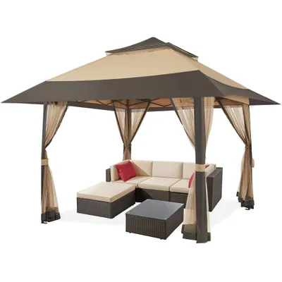 A gazebo with outdoor furniture inside, set against a white background.